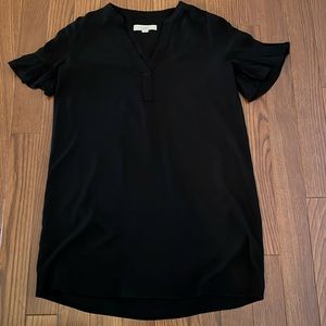 Great little black LOfT dress with added ruffle sleeve detail.  Size S